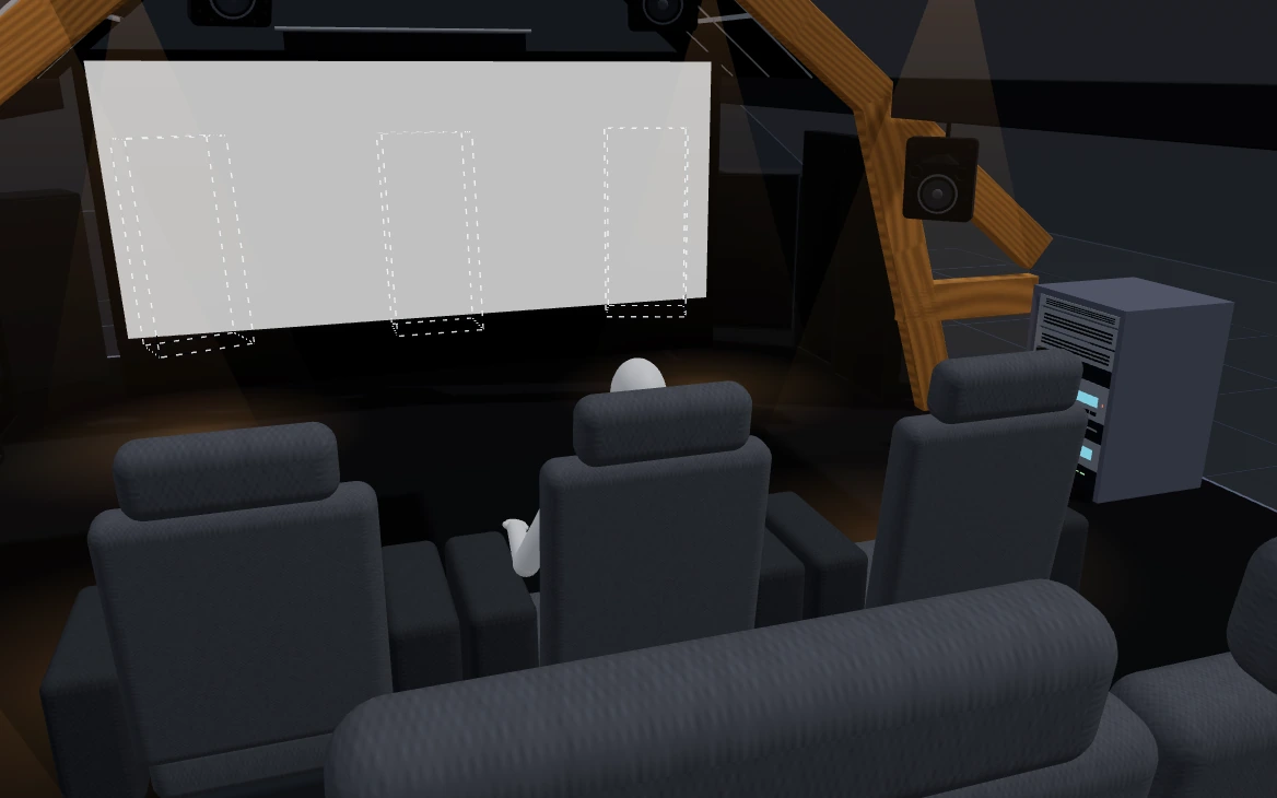 The room seen from the back, behind the seats: the screen framed by the truss, the recliners, the rack and the spotlights