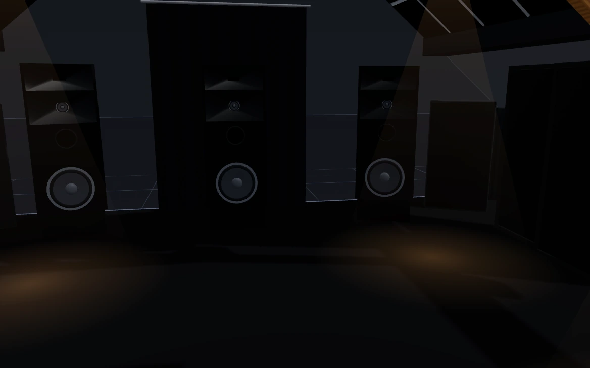 The front stage seen from the seats with the screen hidden: three horn-loaded front speakers and the subwoofers