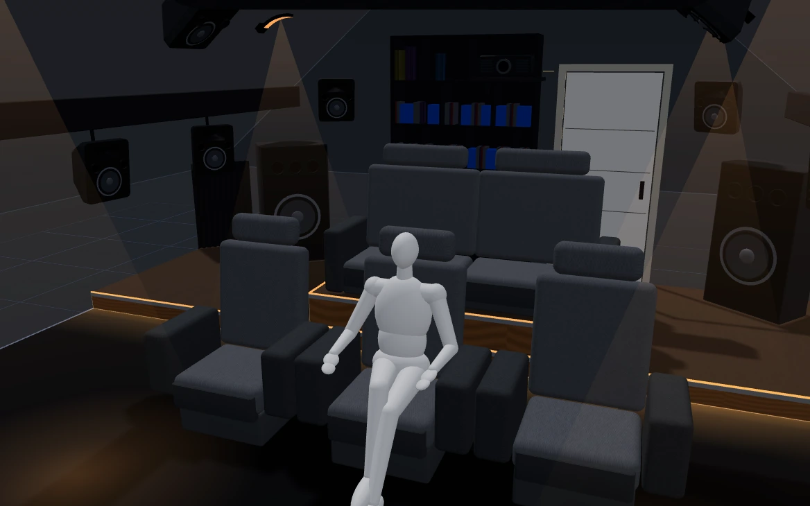 The seats seen from the front: recliners, the second-row sofa on its LED-lit riser, bookcase, surround speakers and spotlights